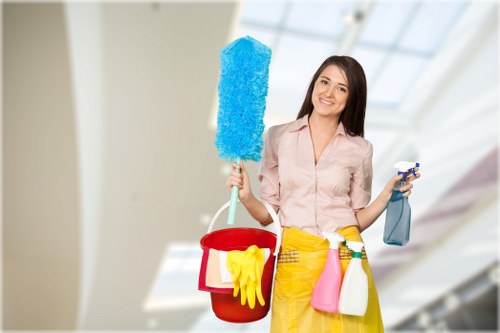 Deep cleaning a living room sofa in a SW17 property